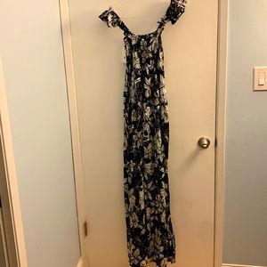 NEW with Tags still on.  Smocked comfortable Maxi dress with front slits.